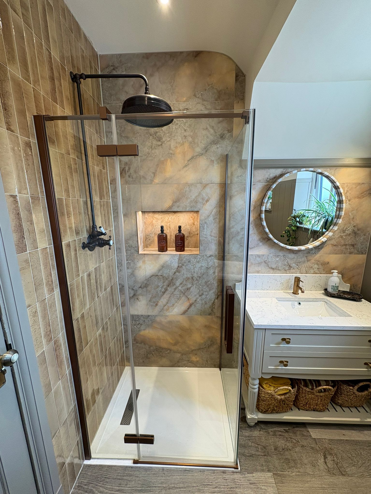 Marble walk-in shower with classic vanity